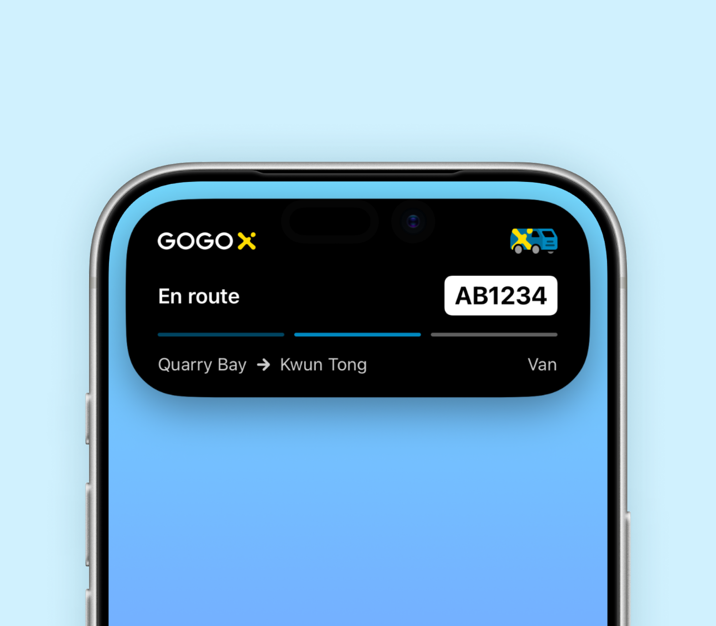 iPhone showing the expanded Dynamic Island with an en route Live Activity